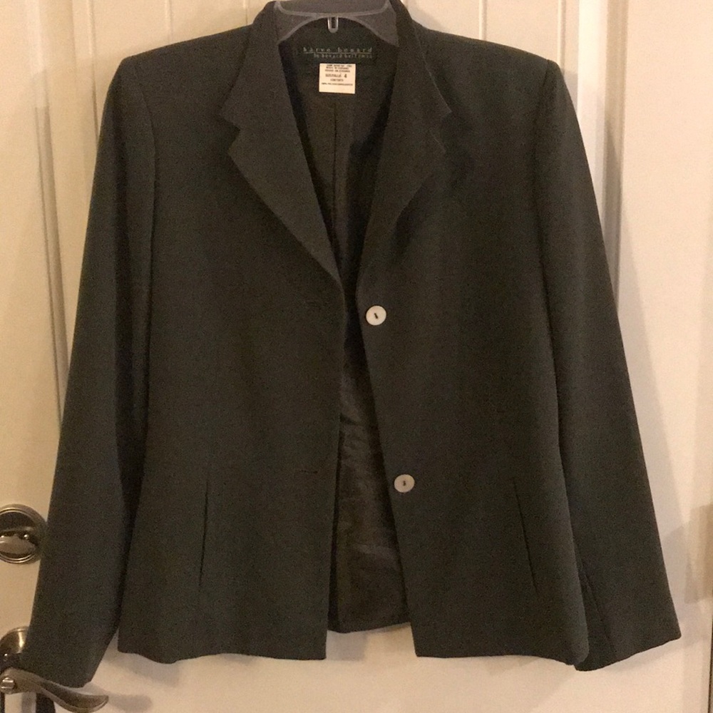Dark green blazer with white opal colored buttons